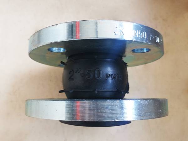 A 2-inch diameter single-sphere rubber expansion joint marked with specification information