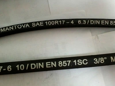 There are two steel wire reinforced hydraulic hoses displayed, which have different diameters.